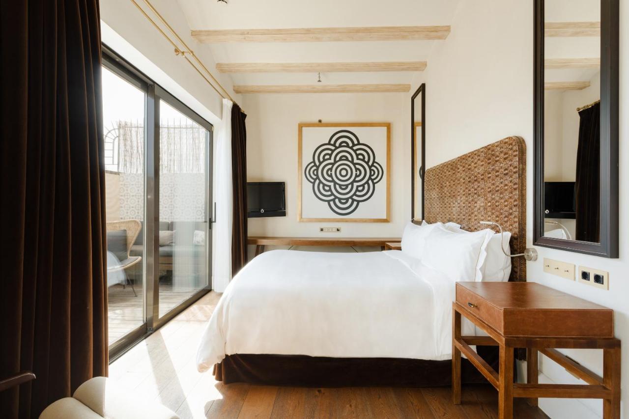 Do Placa Reial Powered By Sonder Barcelona Exterior foto A bedroom at the hotel