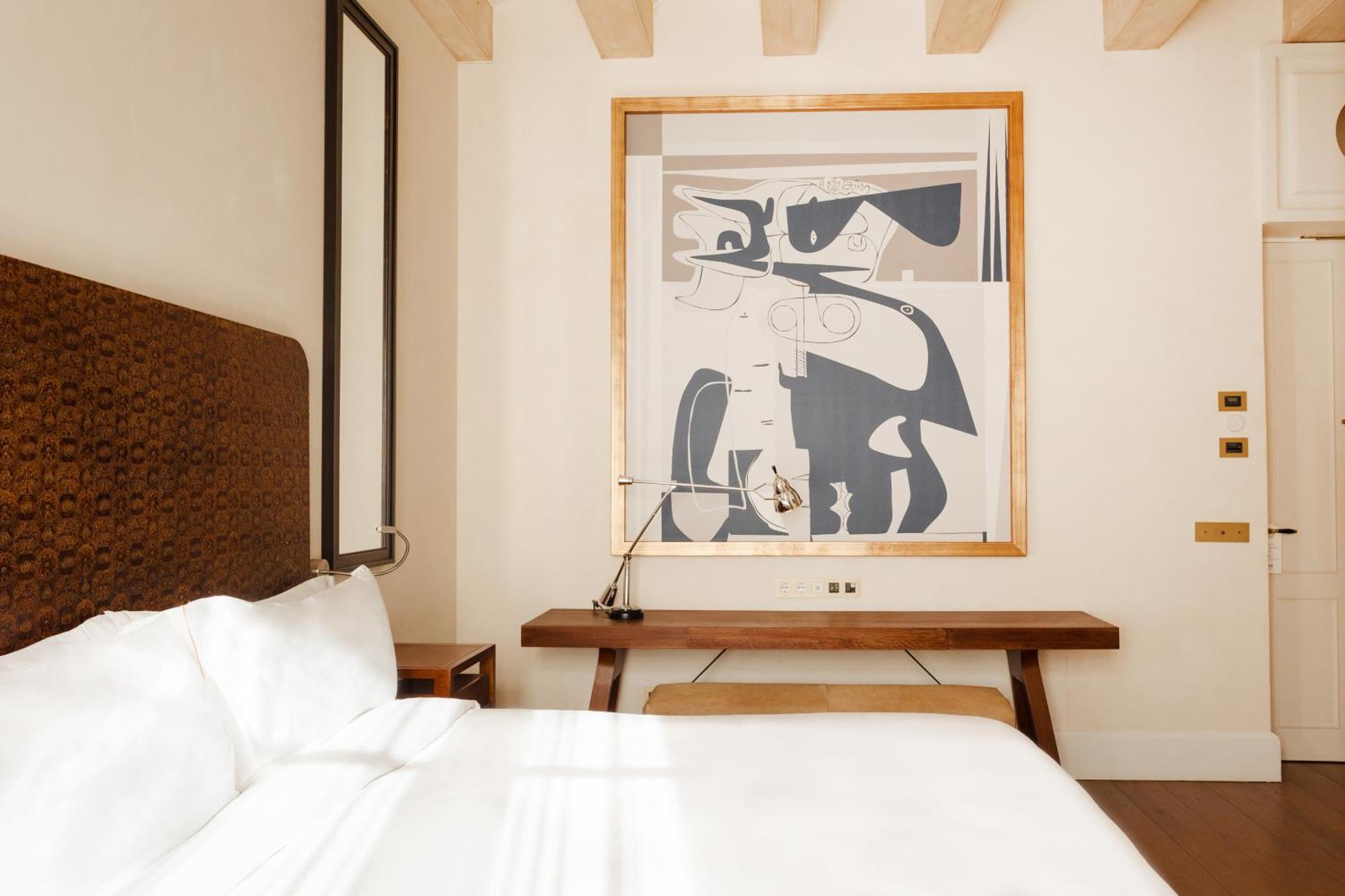 Do Placa Reial Powered By Sonder Barcelona Cameră foto A bedroom at the Hotel Chaco